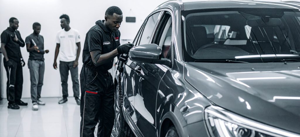 Firefly Create a 1164 px by 400 px ultra-high-resolution (4K) image showing a close-up of car detail (5) - Carbon Car Care – Driving Africa’s automotive market Best Premium Car Detailing for Better Resale Value
