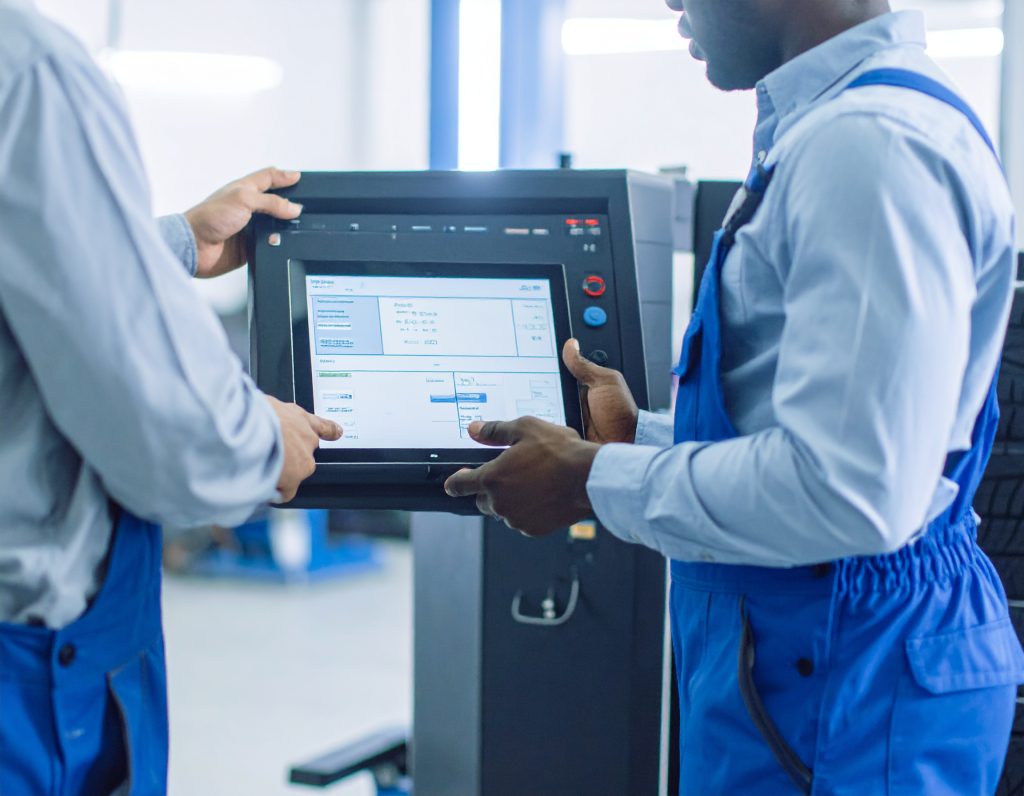 Firefly_Hyper-realistic close-up of modern automotive machines used for wheel alignment and w 574162 - Carbon Car Care – Driving Africa’s automotive market Suspension Repair in Malawi